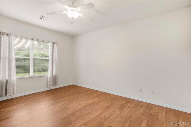 2459 N Brentwood Cir, Lecanto, FL 34461 - unfurnished room featuring light wood-style flooring and ceiling fan