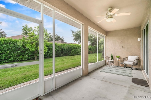 2459 N Brentwood Cir, Lecanto, FL 34461 - unfurnished sunroom featuring a ceiling fan