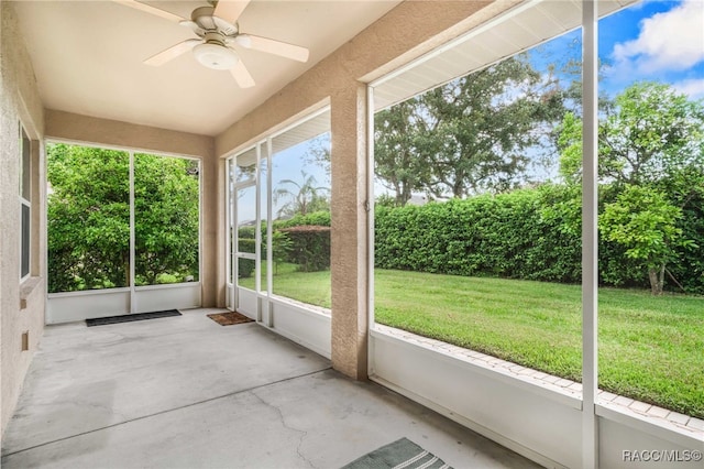 2459 N Brentwood Cir, Lecanto, FL 34461 - unfurnished sunroom featuring ceiling fan