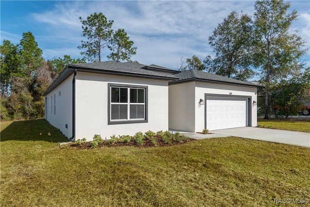 view of front of home featuring a garage and a front lawn