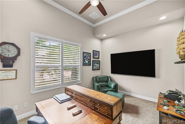 carpeted office featuring ceiling fan and ornamental molding