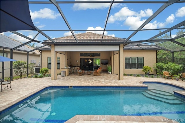 1462 N Ridge Meadow Path, Hernando, FL 34442 - outdoor pool with a patio area and glass enclosure