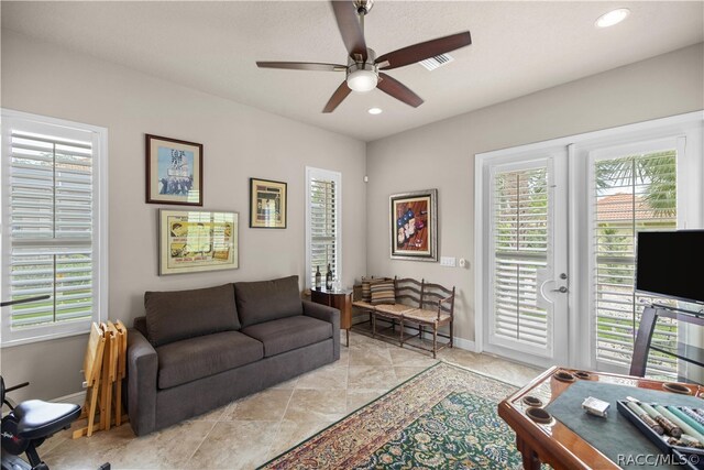 living room with ceiling fan