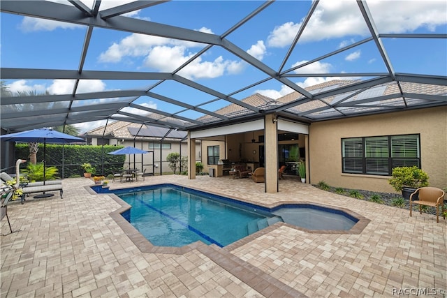 view of swimming pool featuring a lanai, a patio area, and an outdoor living space