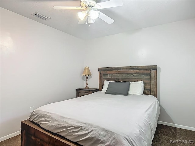 bedroom with carpet floors, baseboards, visible vents, and ceiling fan