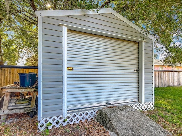 view of shed with fence