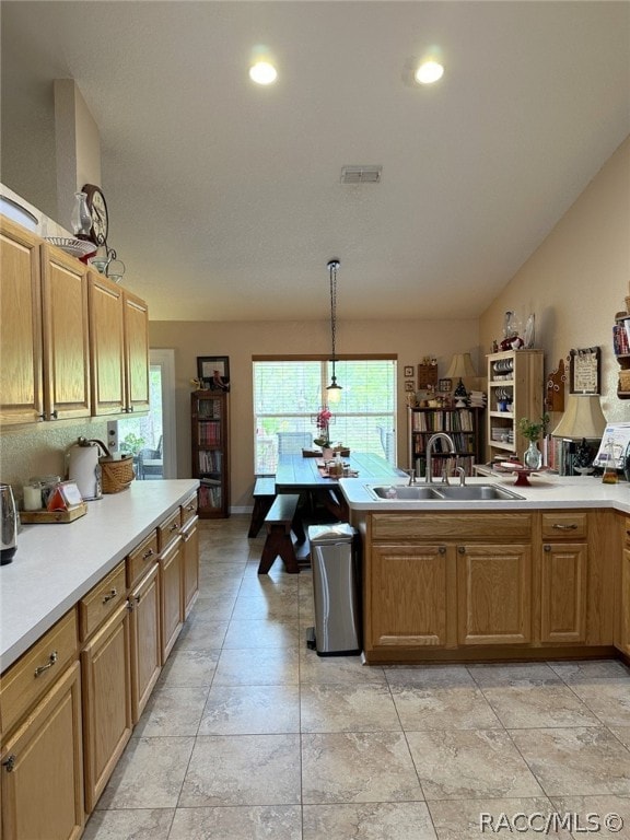 kitchen with sink and pendant lighting