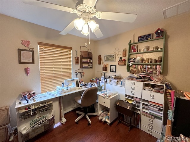 office space with dark hardwood / wood-style floors and ceiling fan