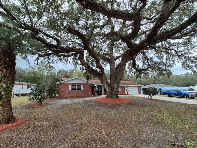 single story home with a garage