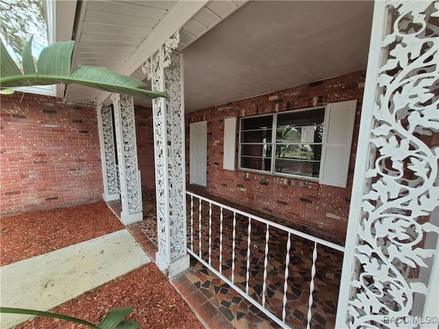 property entrance featuring covered porch