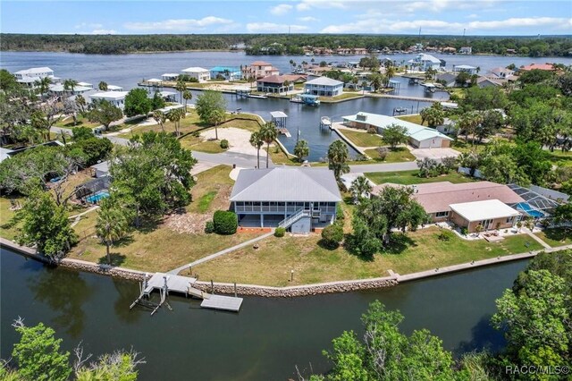 2168 N Watersedge Dr, Crystal River, FL 34429 - aerial perspective of suburban area with a large body of water