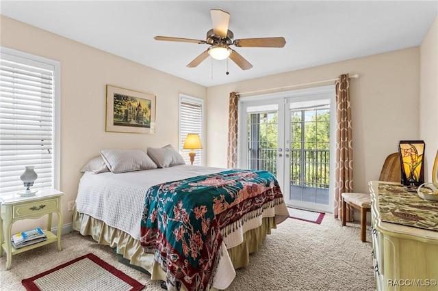2168 N Watersedge Dr, Crystal River, FL 34429 - bedroom with light colored carpet, access to exterior, and a ceiling fan