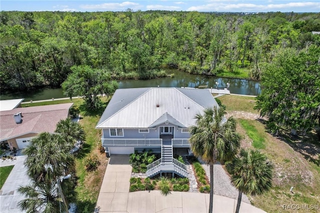 2168 N Watersedge Dr, Crystal River, FL 34429 - aerial view of property and surrounding area with a forest and a large body of water