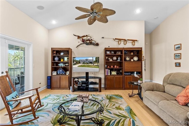 2168 N Watersedge Dr, Crystal River, FL 34429 - living area with wood finished floors, ceiling fan, and high vaulted ceiling