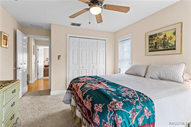 2168 N Watersedge Dr, Crystal River, FL 34429 - bedroom with carpet floors, a ceiling fan, and a closet