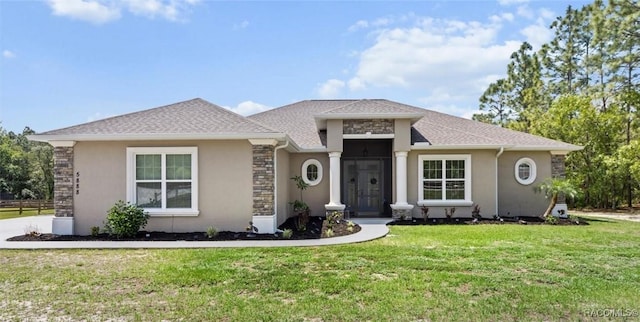 5888 W Corral Pl, Beverly Hills, FL 34465 - view of front of property featuring stucco siding, a front yard, and stone siding