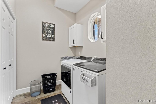 5888 W Corral Pl, Beverly Hills, FL 34465 - laundry room with washer and dryer, cabinet space, and baseboards