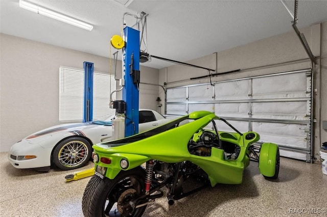5888 W Corral Pl, Beverly Hills, FL 34465 - garage with a garage door opener