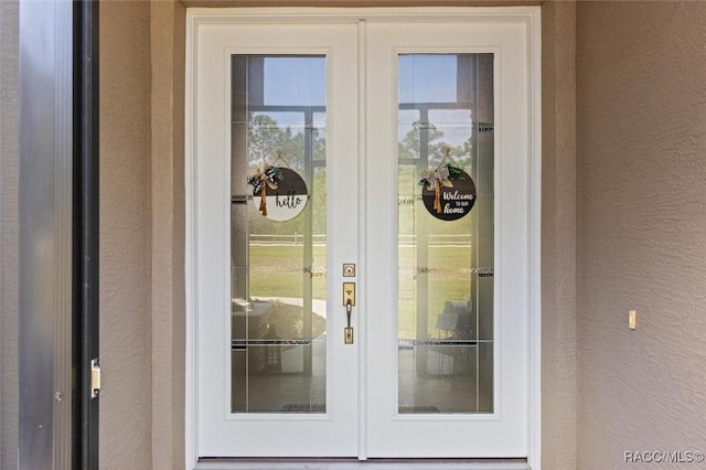 5888 W Corral Pl, Beverly Hills, FL 34465 - view of exterior entry with french doors