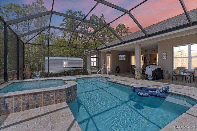 5888 W Corral Pl, Beverly Hills, FL 34465 - view of swimming pool with grilling area, a patio, a pool with connected hot tub, and glass enclosure