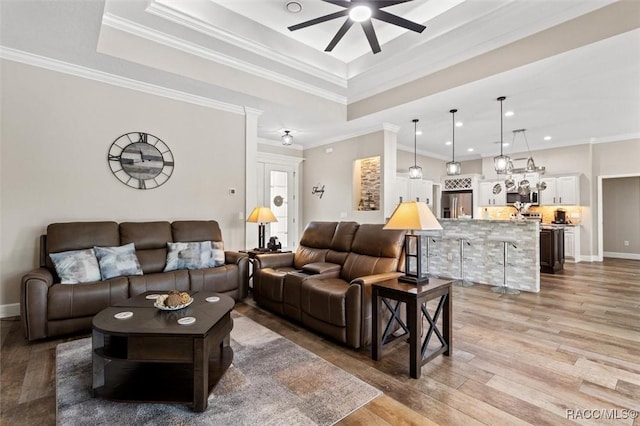 5888 W Corral Pl, Beverly Hills, FL 34465 - living area featuring ceiling fan, a tray ceiling, light wood finished floors, recessed lighting, and baseboards