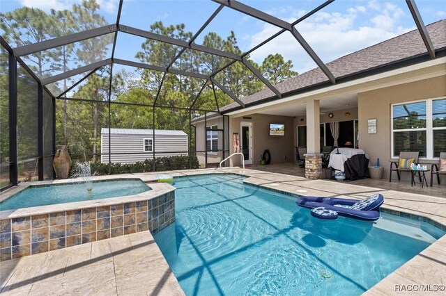 5888 W Corral Pl, Beverly Hills, FL 34465 - view of swimming pool featuring a patio, a grill, a pool with connected hot tub, and a lanai