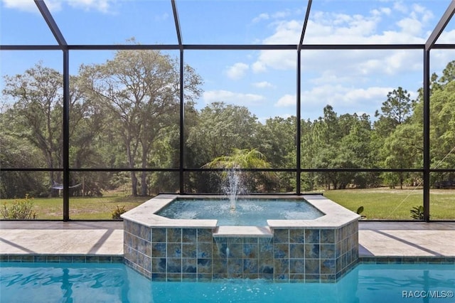 5888 W Corral Pl, Beverly Hills, FL 34465 - view of swimming pool featuring a lanai and a pool with connected hot tub