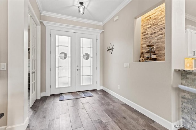 5888 W Corral Pl, Beverly Hills, FL 34465 - entryway featuring french doors, ornamental molding, wood finished floors, and baseboards