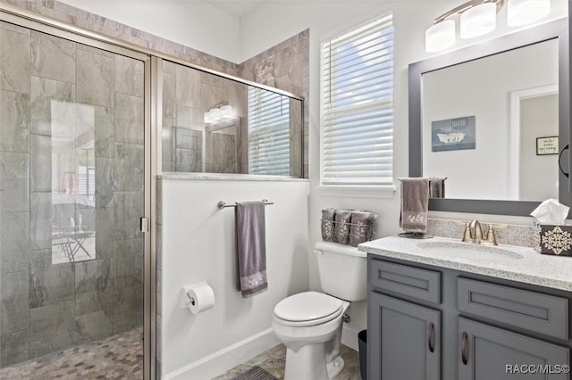 5888 W Corral Pl, Beverly Hills, FL 34465 - full bath featuring a shower stall, toilet, vanity, and baseboards