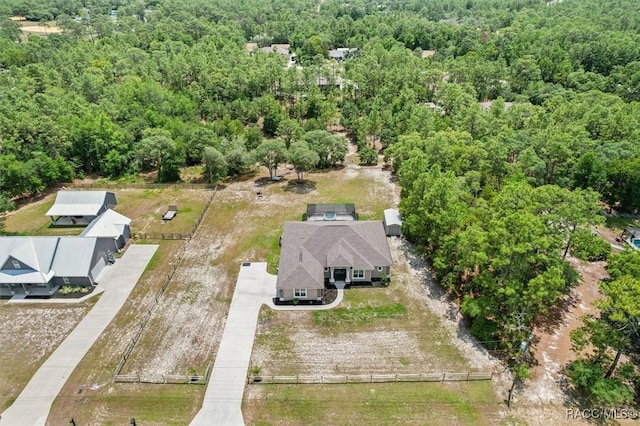 5888 W Corral Pl, Beverly Hills, FL 34465 - view of subject property with a heavily wooded area