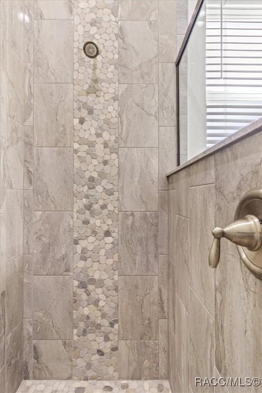 5888 W Corral Pl, Beverly Hills, FL 34465 - full bathroom with a tile shower