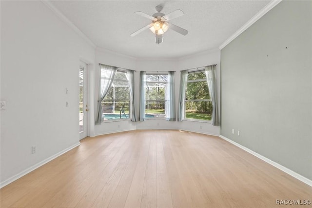 4491 W Stable Ct, Beverly Hills, FL 34465 - unfurnished room with crown molding, light wood finished floors, and ceiling fan