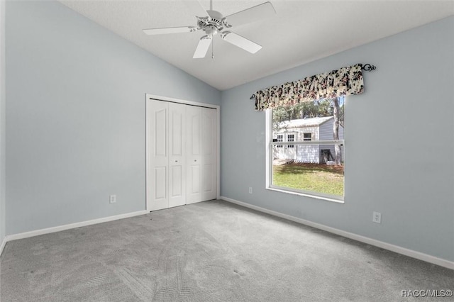 4491 W Stable Ct, Beverly Hills, FL 34465 - unfurnished bedroom with carpet flooring, lofted ceiling, a closet, and ceiling fan