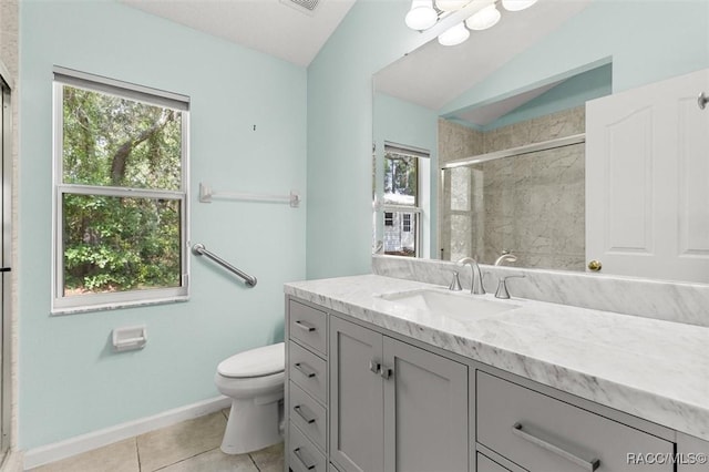 4491 W Stable Ct, Beverly Hills, FL 34465 - bathroom featuring a shower stall, vanity, healthy amount of natural light, tile patterned flooring, and lofted ceiling
