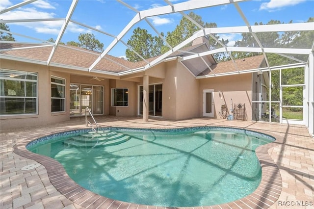 4491 W Stable Ct, Beverly Hills, FL 34465 - swimming pool with a patio area, a ceiling fan, and a lanai