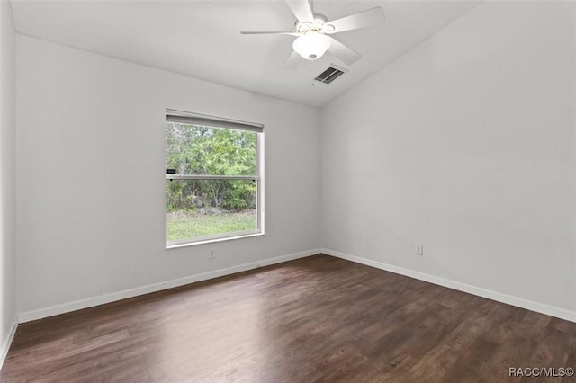 4491 W Stable Ct, Beverly Hills, FL 34465 - spare room featuring lofted ceiling, dark wood finished floors, and a ceiling fan