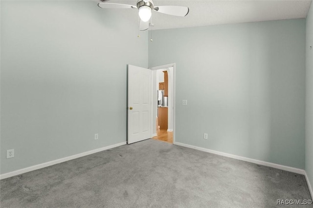 4491 W Stable Ct, Beverly Hills, FL 34465 - carpeted spare room with a ceiling fan and baseboards