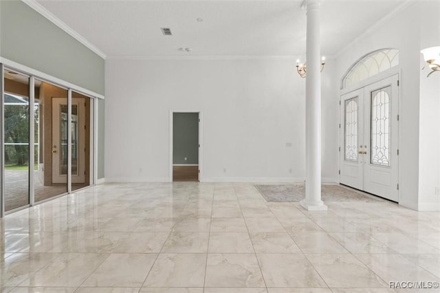 4491 W Stable Ct, Beverly Hills, FL 34465 - foyer entrance with ornamental molding, marble tiled floors, ornate columns, and french doors
