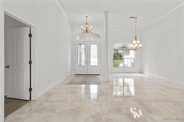 4491 W Stable Ct, Beverly Hills, FL 34465 - foyer entrance with a chandelier, crown molding, french doors, and marble finish floors