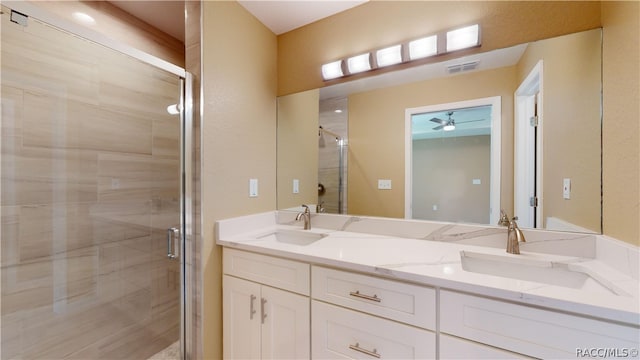 bathroom with vanity and walk in shower