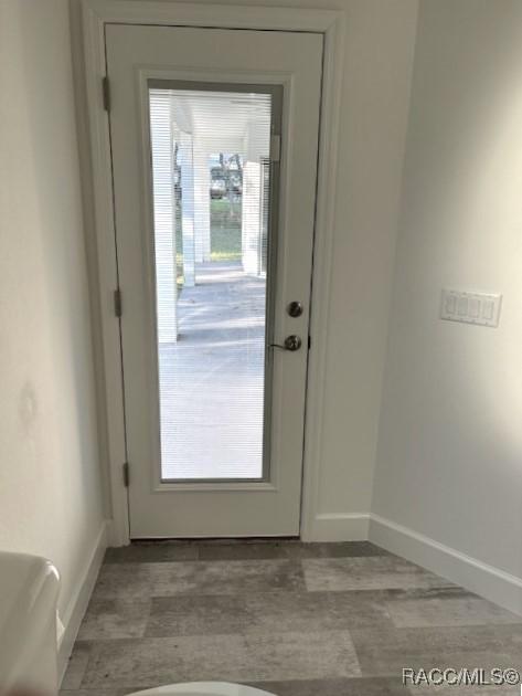 4496 N Elkcam Blvd, Beverly Hills, FL 34465 - entryway featuring baseboards and wood finished floors