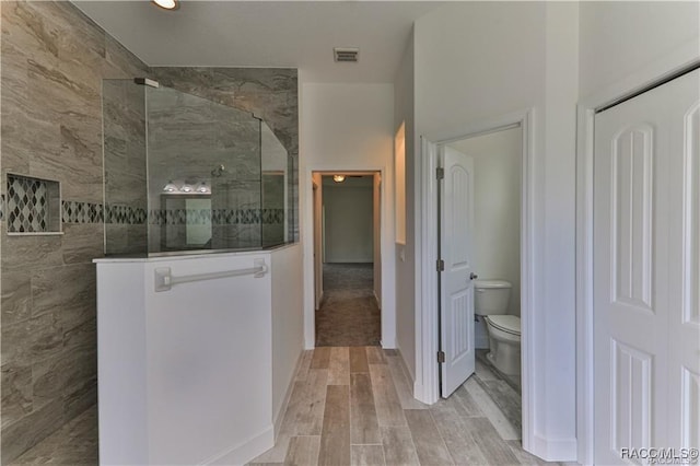 4496 N Elkcam Blvd, Beverly Hills, FL 34465 - full bathroom with a walk in shower and wood finished floors