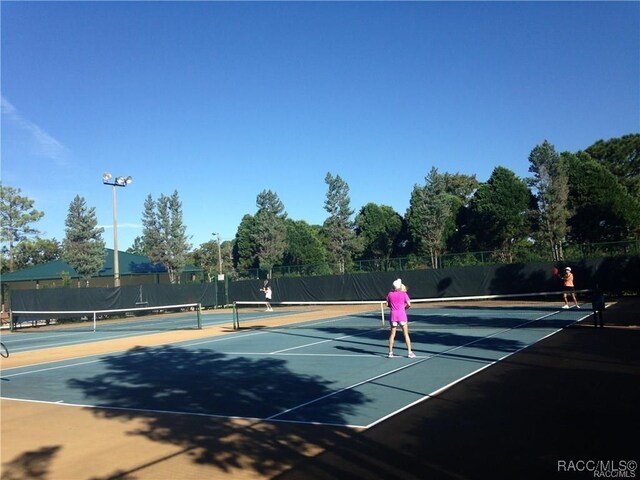 4496 N Elkcam Blvd, Beverly Hills, FL 34465 - view of tennis court