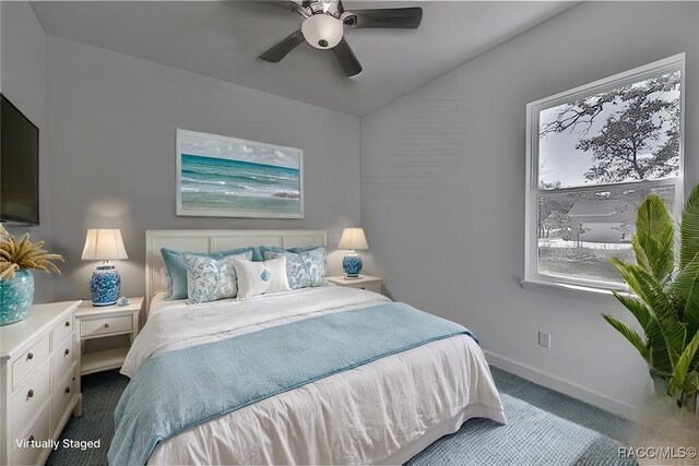 4496 N Elkcam Blvd, Beverly Hills, FL 34465 - carpeted bedroom featuring baseboards and a ceiling fan