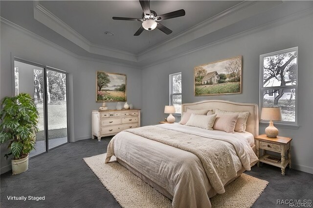 4496 N Elkcam Blvd, Beverly Hills, FL 34465 - bedroom featuring access to outside, dark carpet, a raised ceiling, crown molding, and multiple windows