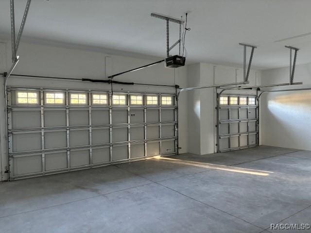 4496 N Elkcam Blvd, Beverly Hills, FL 34465 - garage with a garage door opener