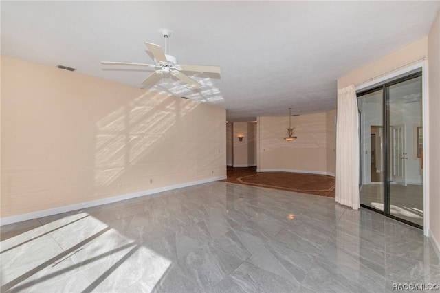 unfurnished living room featuring ceiling fan