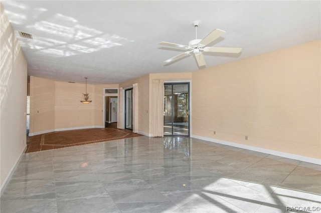 3356 N Bent Tree Pt, Lecanto, FL 34461 - empty room featuring marble finish floors and ceiling fan