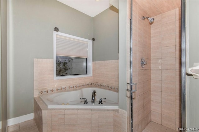 3356 N Bent Tree Pt, Lecanto, FL 34461 - bathroom featuring a shower stall, a tub with jets, and tile patterned floors