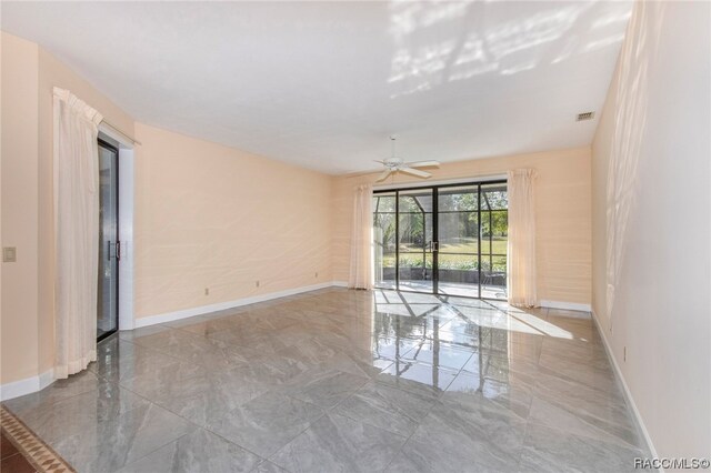 empty room with ceiling fan